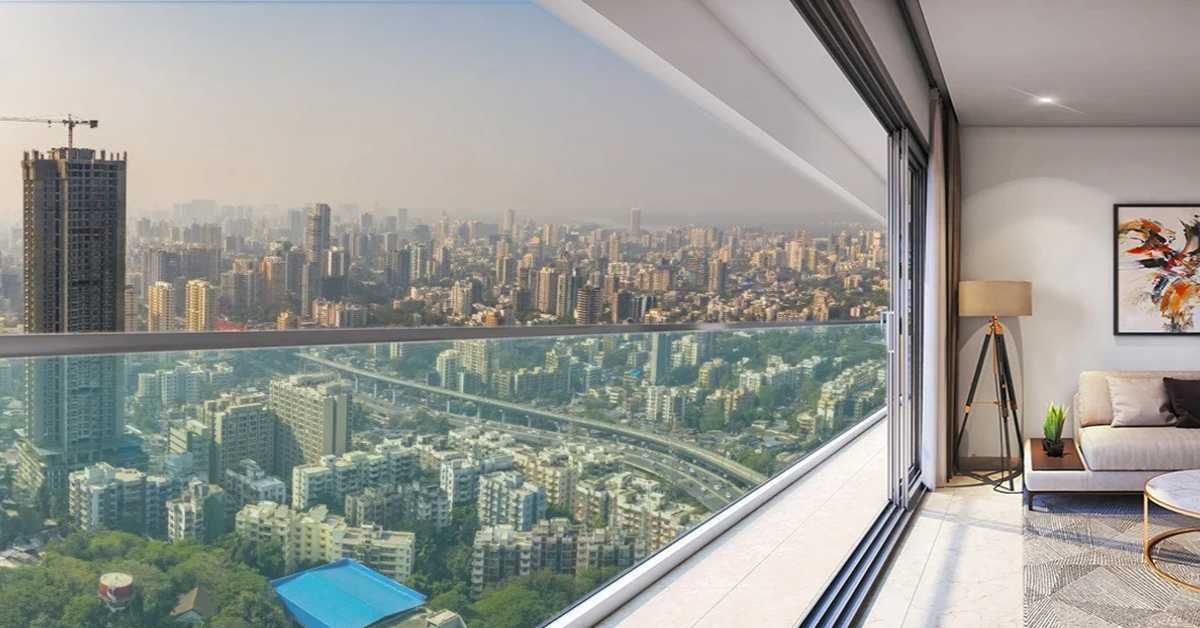 A luxurious living room with a city view, showcasing the Godrej Alira project in Sector 39, Gurgaon.